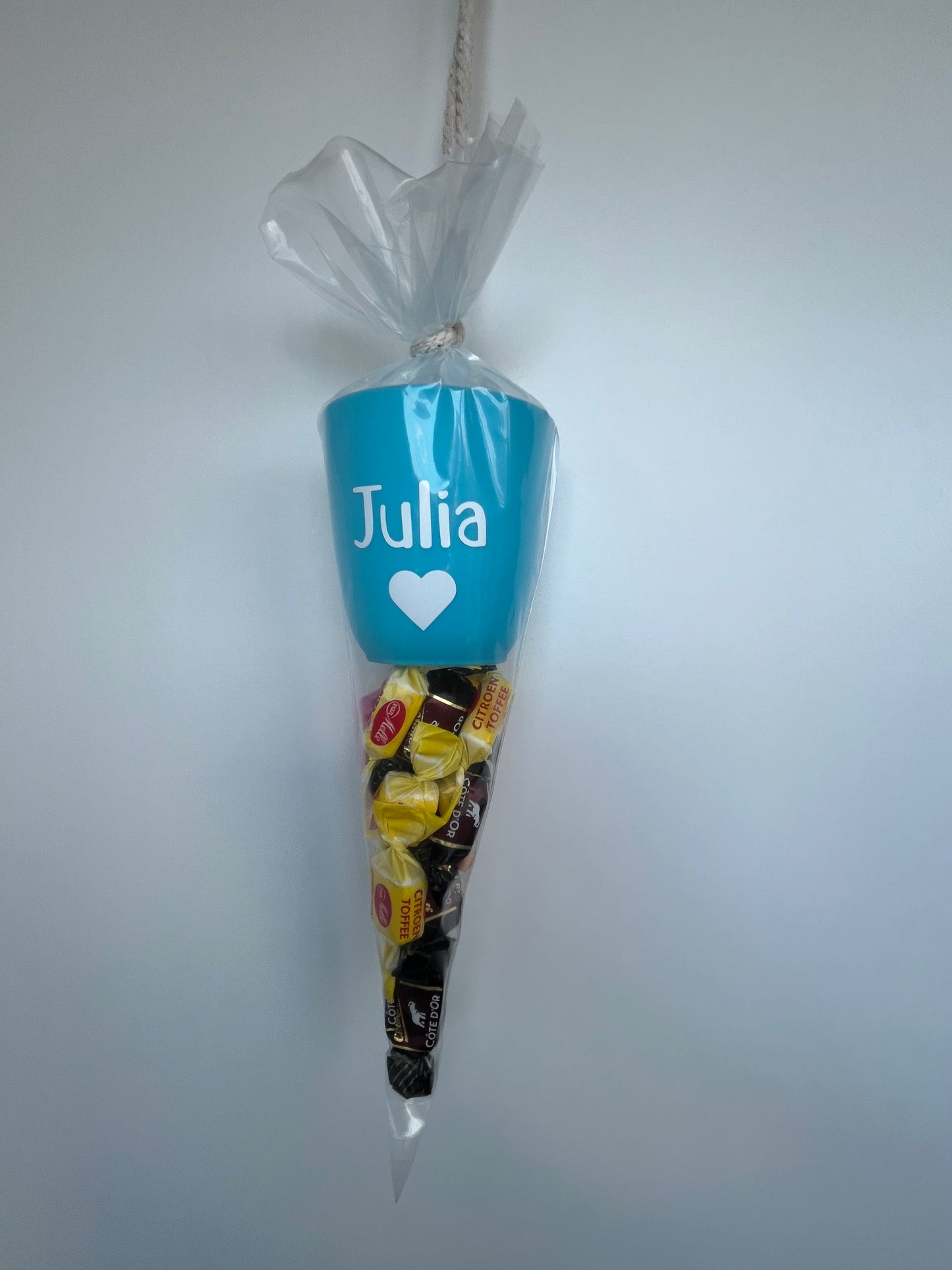 Puntzak snoep met beker